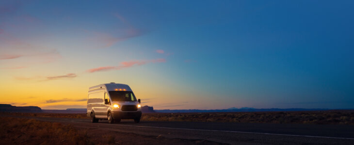 Delivery commercial van speeding on rural road in Arizona